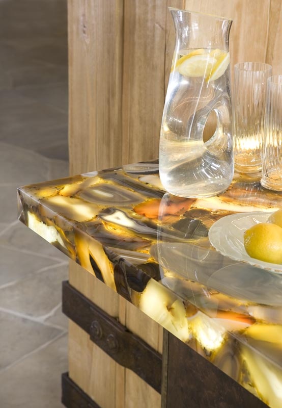 an onyx countertop with built-in light is a gorgeous and luxurious option of a chic material accented with lights