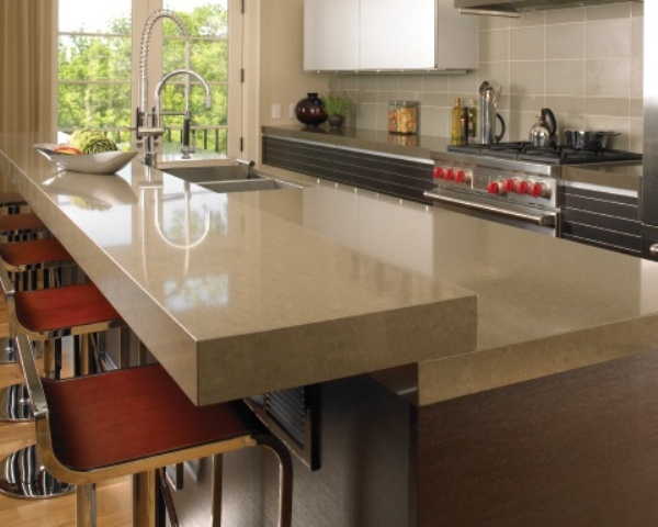 Sleek neutral stone countertops make a perfect complement for a modern and chic kitchen design