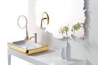 a unique and catchy shaped mirror with beautiful edges, a metallic sink with an additional mirror is a great idea for a sophisticated bathroom