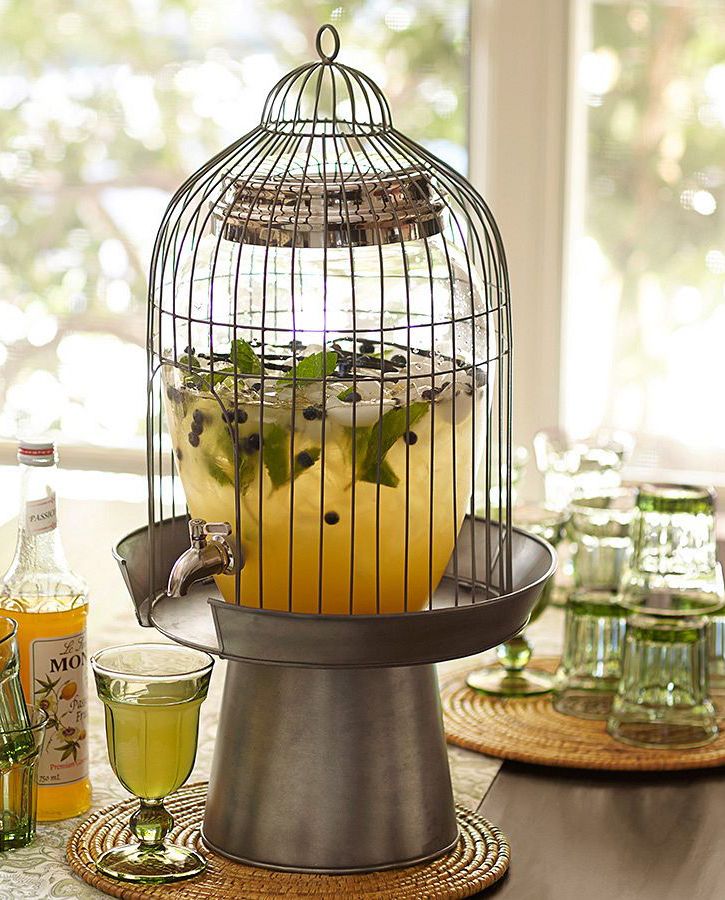Turning a cage into a punch station is great idea for a summer party.