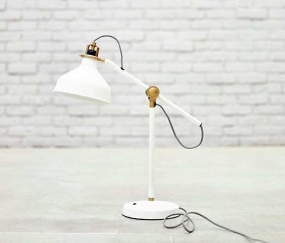 a white and gold IKEA Ranarp lamp will fit many spaces in many styles, it's a timeless design that works