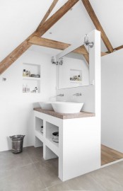 a modern neutral bathroom with white walls, wooden beams, a vanity with two sinks