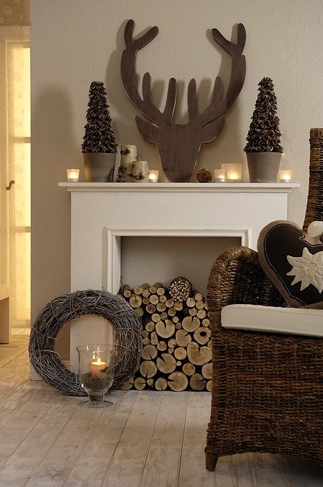 A non working fireplace can be filled with firewood to make it cozier and you can style the mantel in some cute way, too