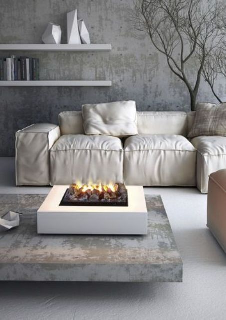 a modern portable mini fireplace with pebbles will instantly cozy up the living room and any other room where you place it