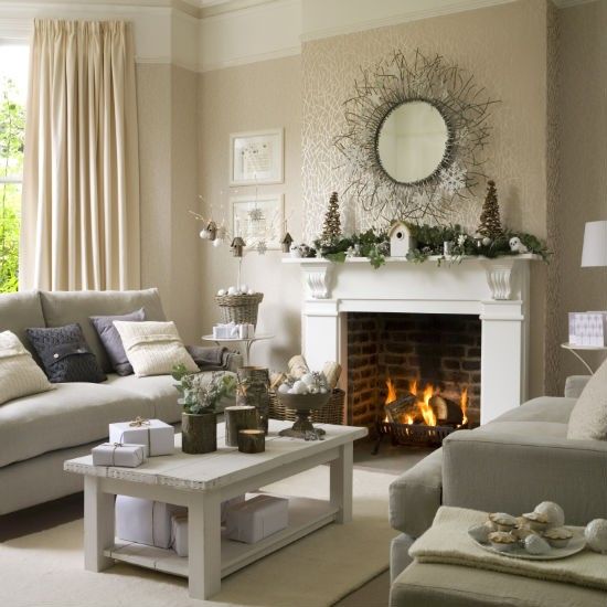 spruce up your living room with greenery decor, tree stumps as holders and candleholders and pinecones