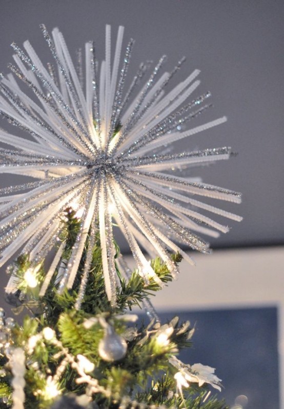an oversized super glam and shiny Christmas tree topper made of white and silver bottle cleaners is a creative idea for a glam Christmas tree