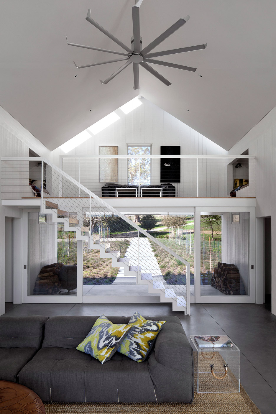 White barn like house with modenr features  5