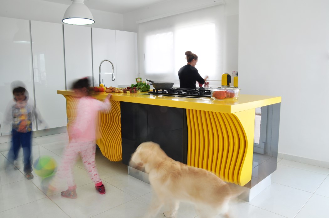 White minimalist kitchen with a sculptural yellow island  4