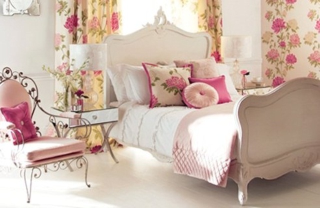 A neutral bedroom with floral curtains and bright bedding and touches of pink make the space feel like spring