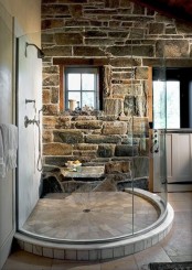 an accent wall clad with real large stone is a gorgeous decor idea that will make you closer to nature